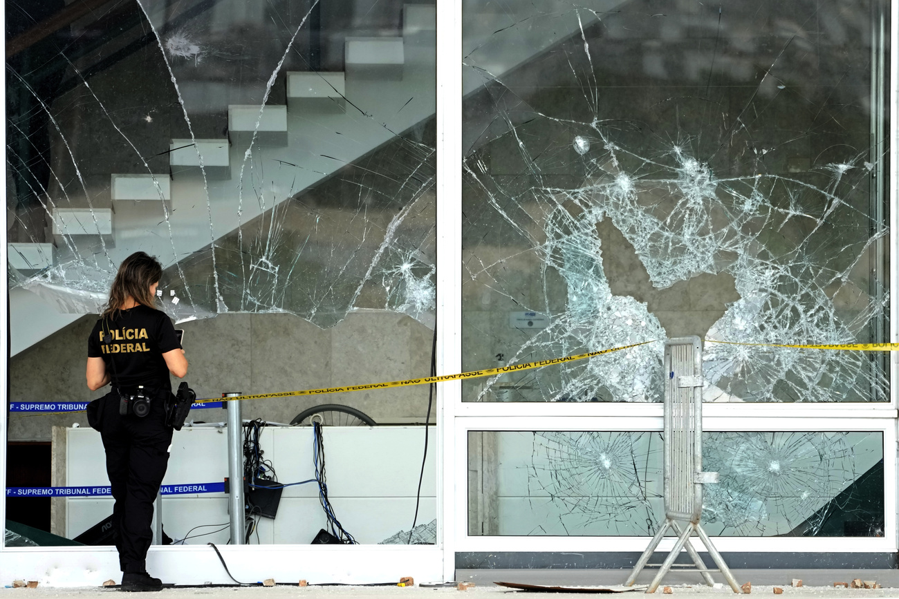 Shattered windows of a government building in Brasilia after January 8, 2023 attack.