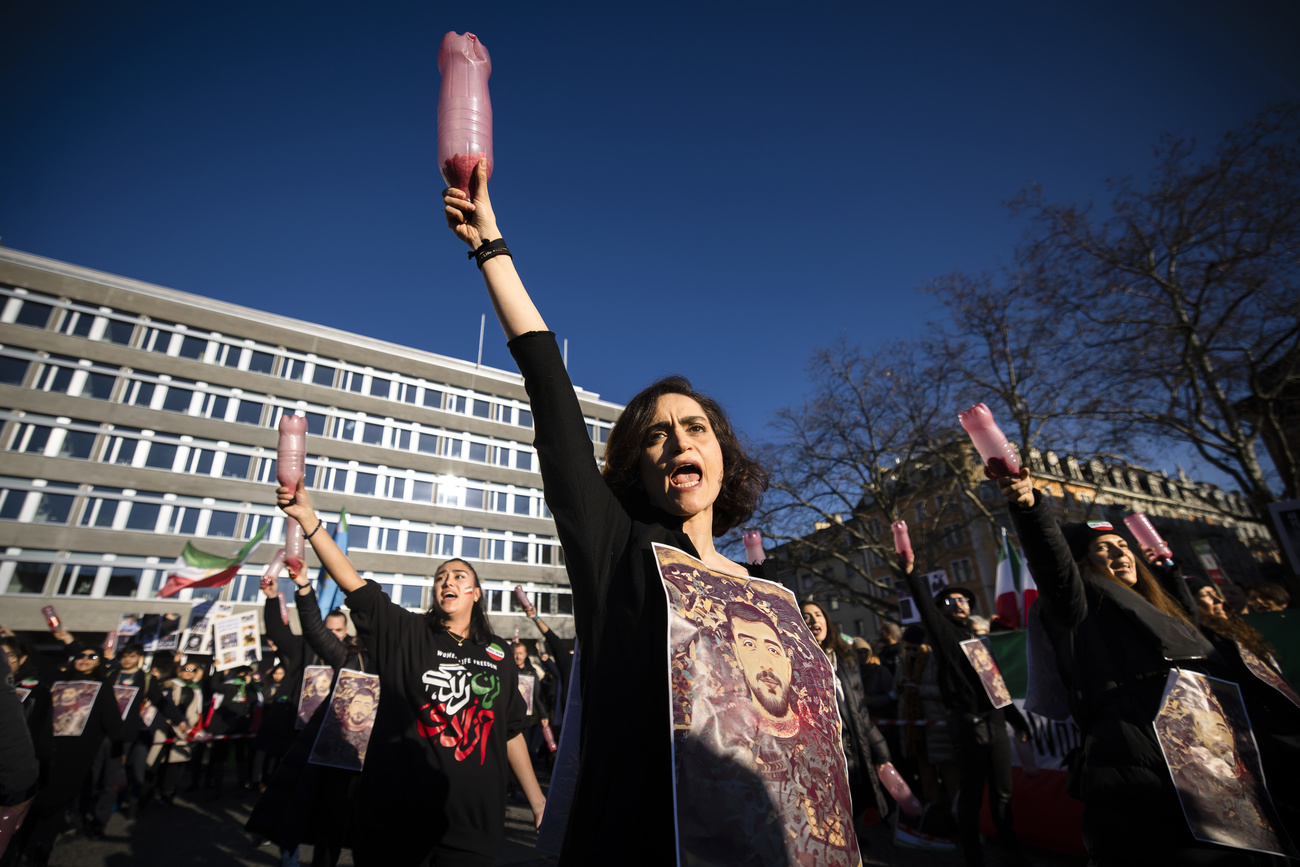 Protestors outside a building in Zurich