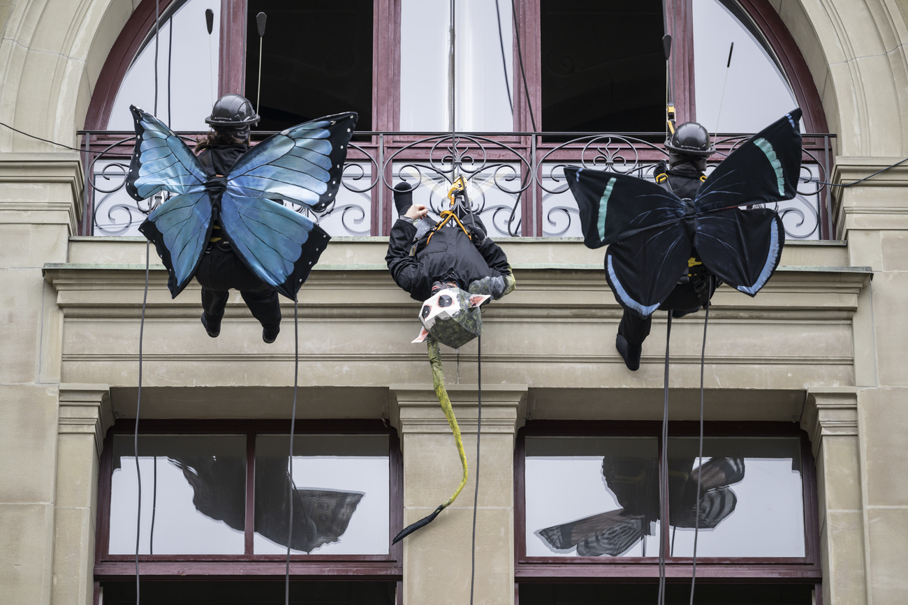 Greenpeace activists and dancers of Öff öff aerial dance