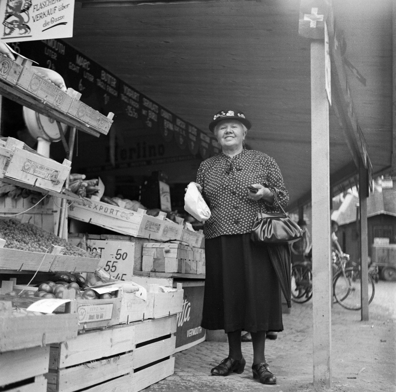 Woman at a vegetable stand