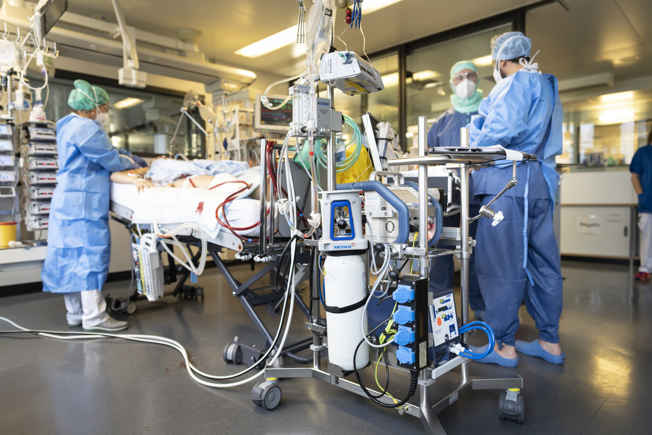 Doctors and nurses in a hospital operating room