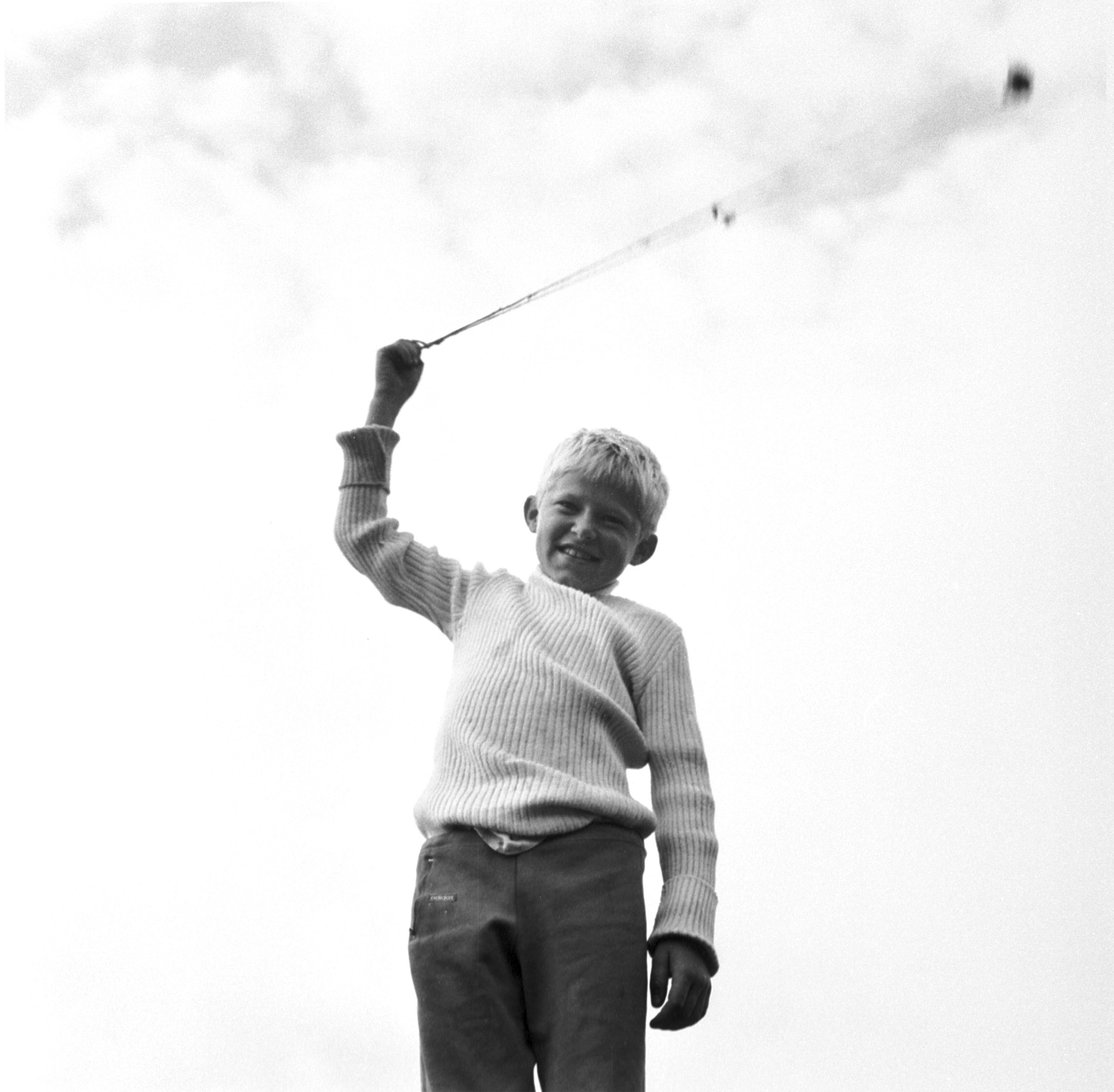 Black and white photograph of a child in a refugee camp in Croatia