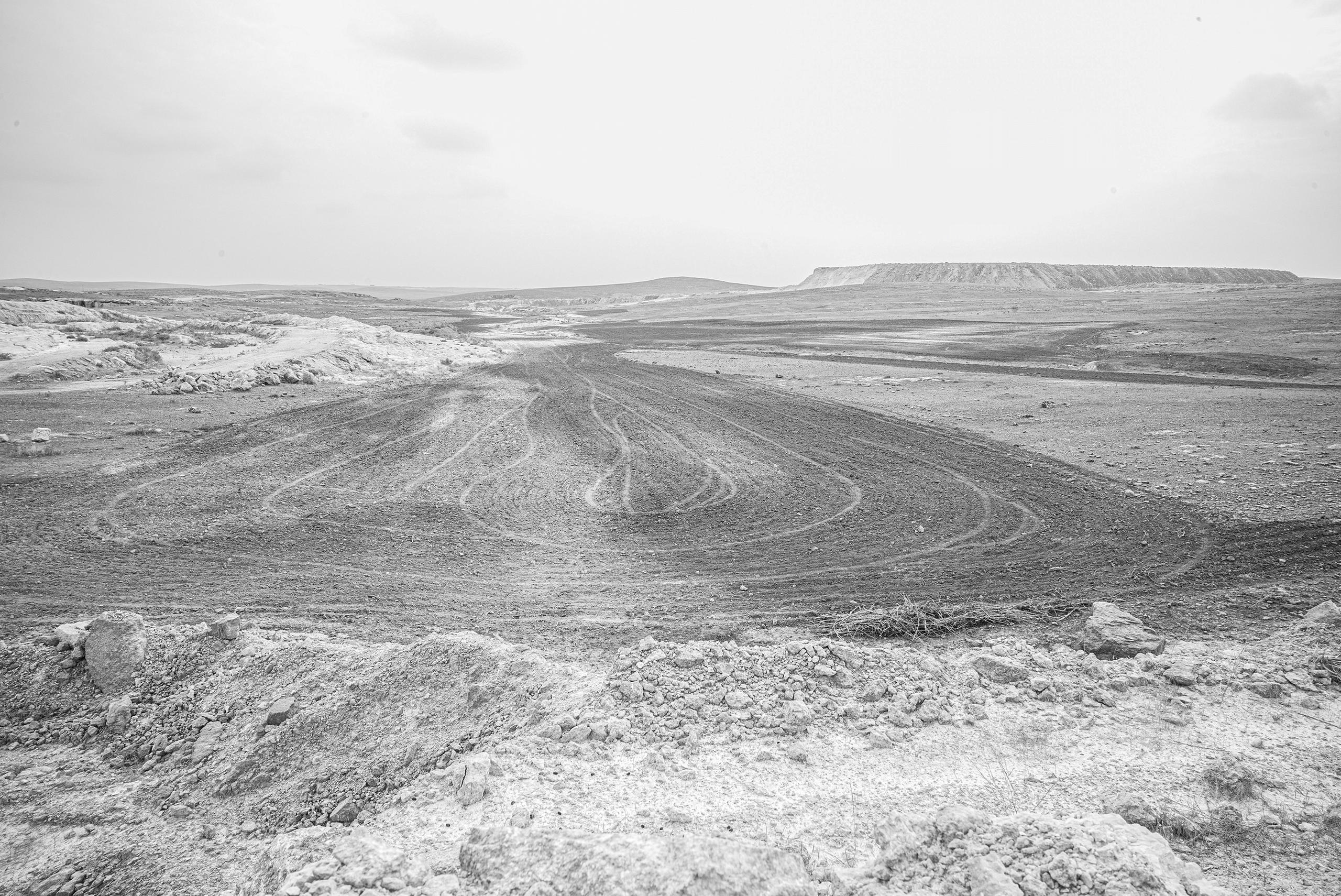Black and white photograph of the desert between Syria and Turkey