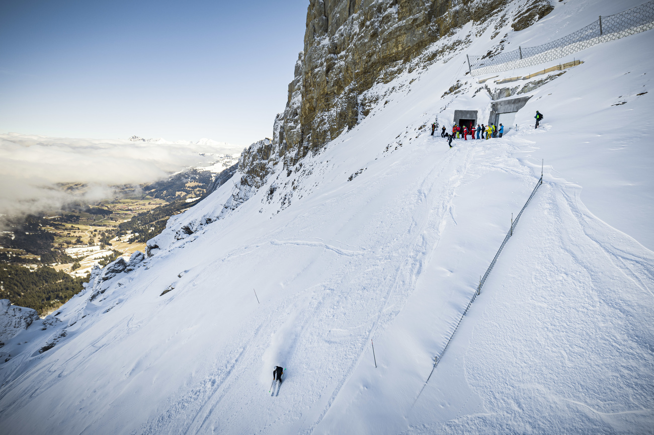 Skiers on mountain