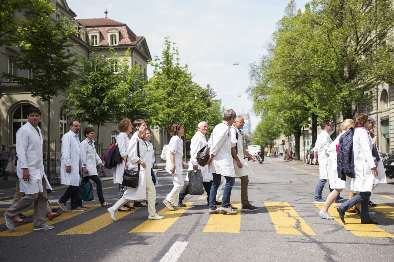 A group of doctors in white coats