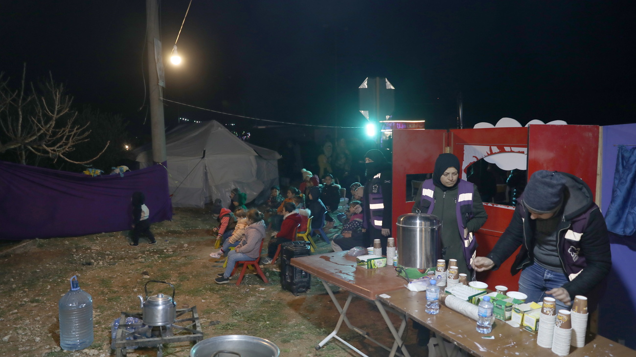 Syrian refugee camp at night