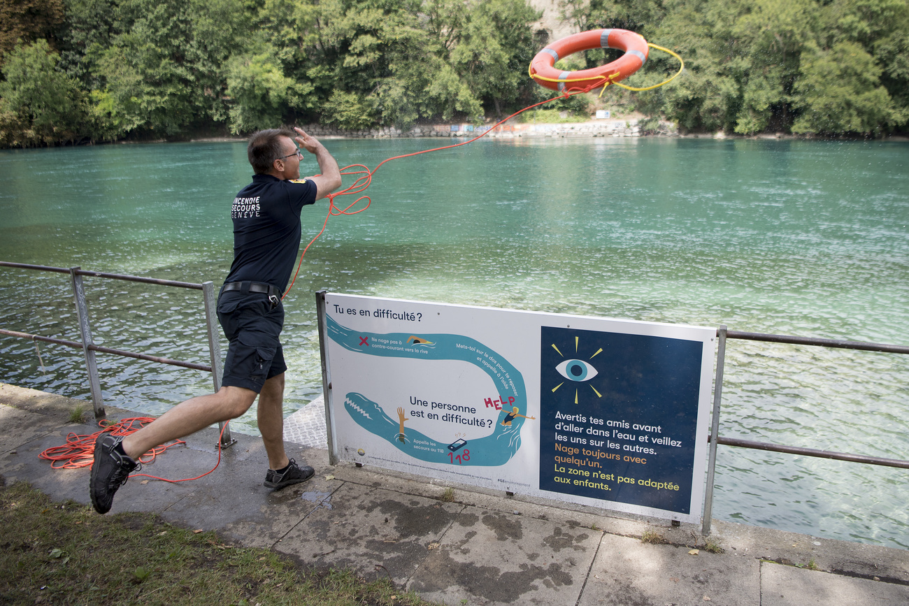 Man throwing a lifebelt into a river