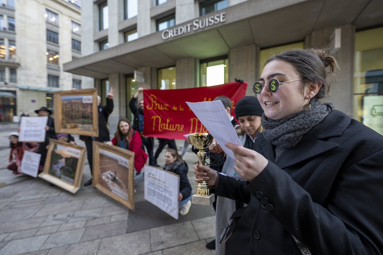 protesters in Geneva outside Credit Suisse