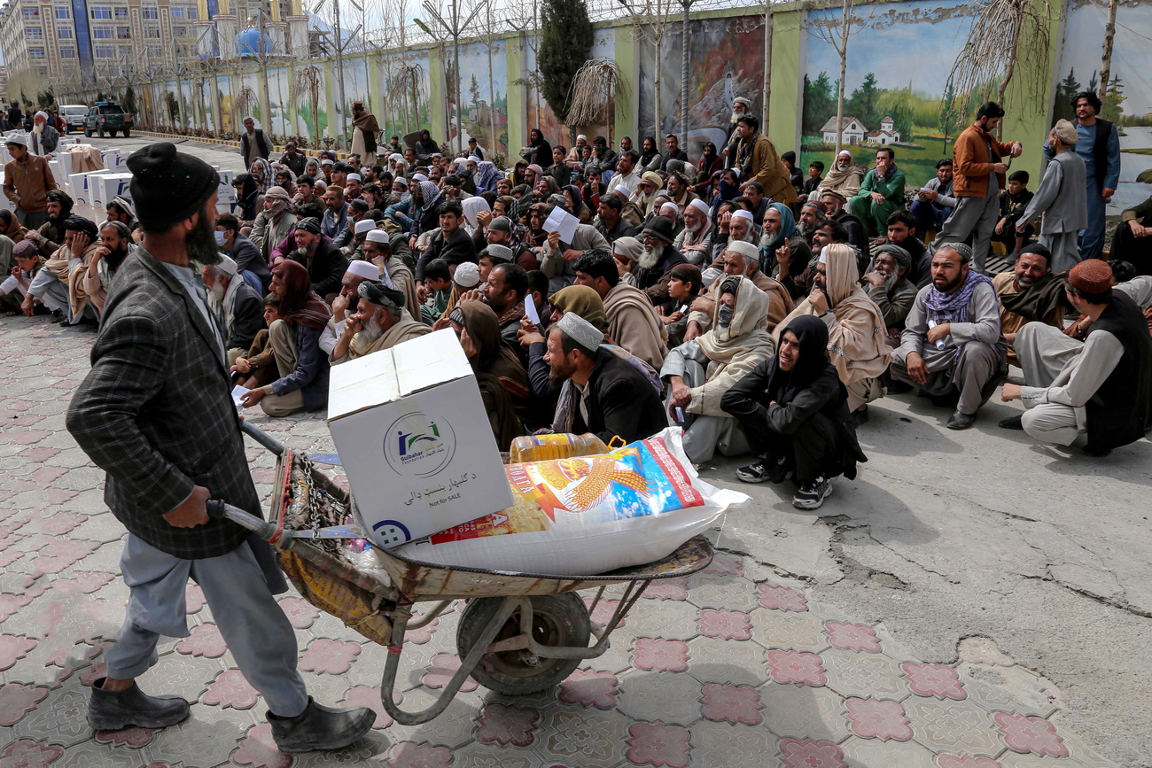 food aid brought to people of Afghanistan on a wheelbarrow
