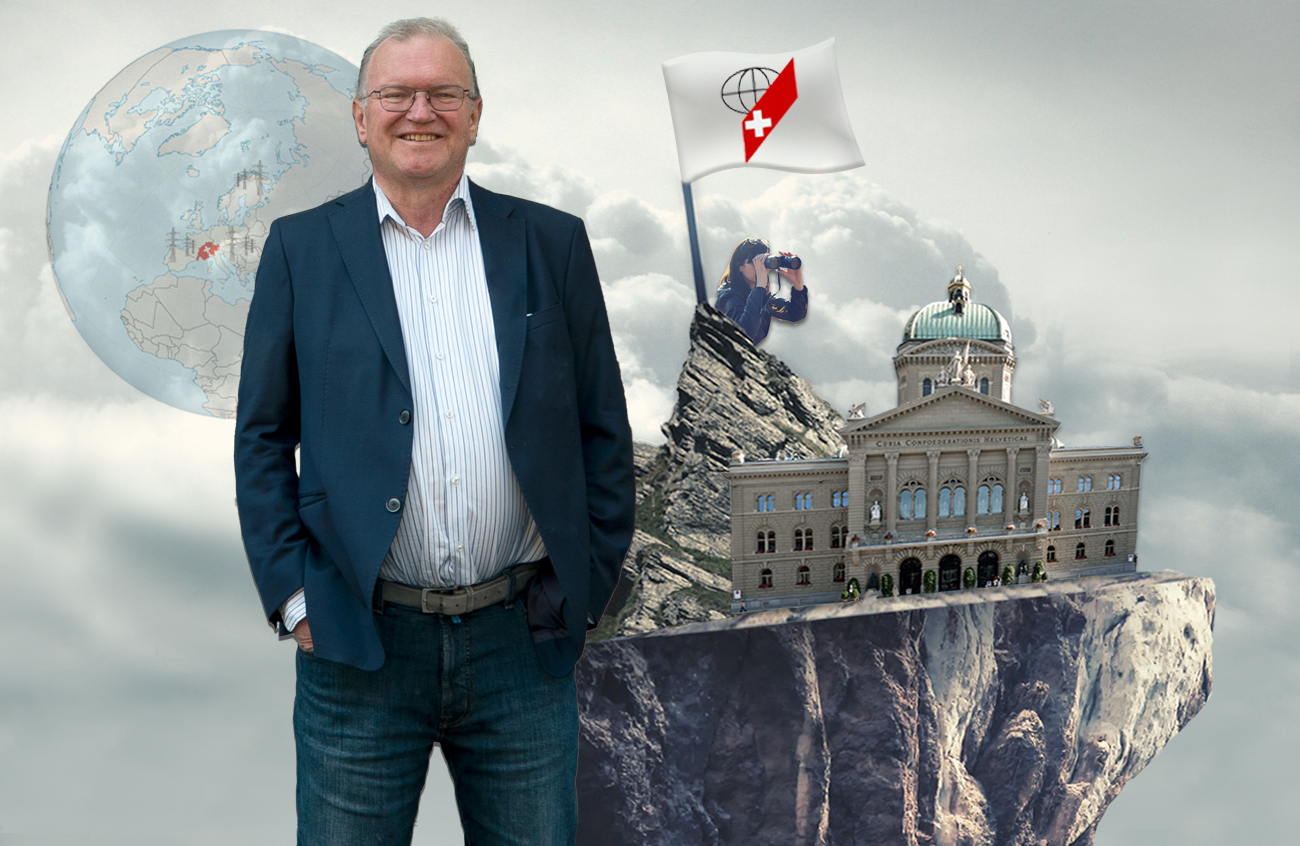 Il politologo Claude Longchamp davanti a un fotomontaggio con palazzo federale