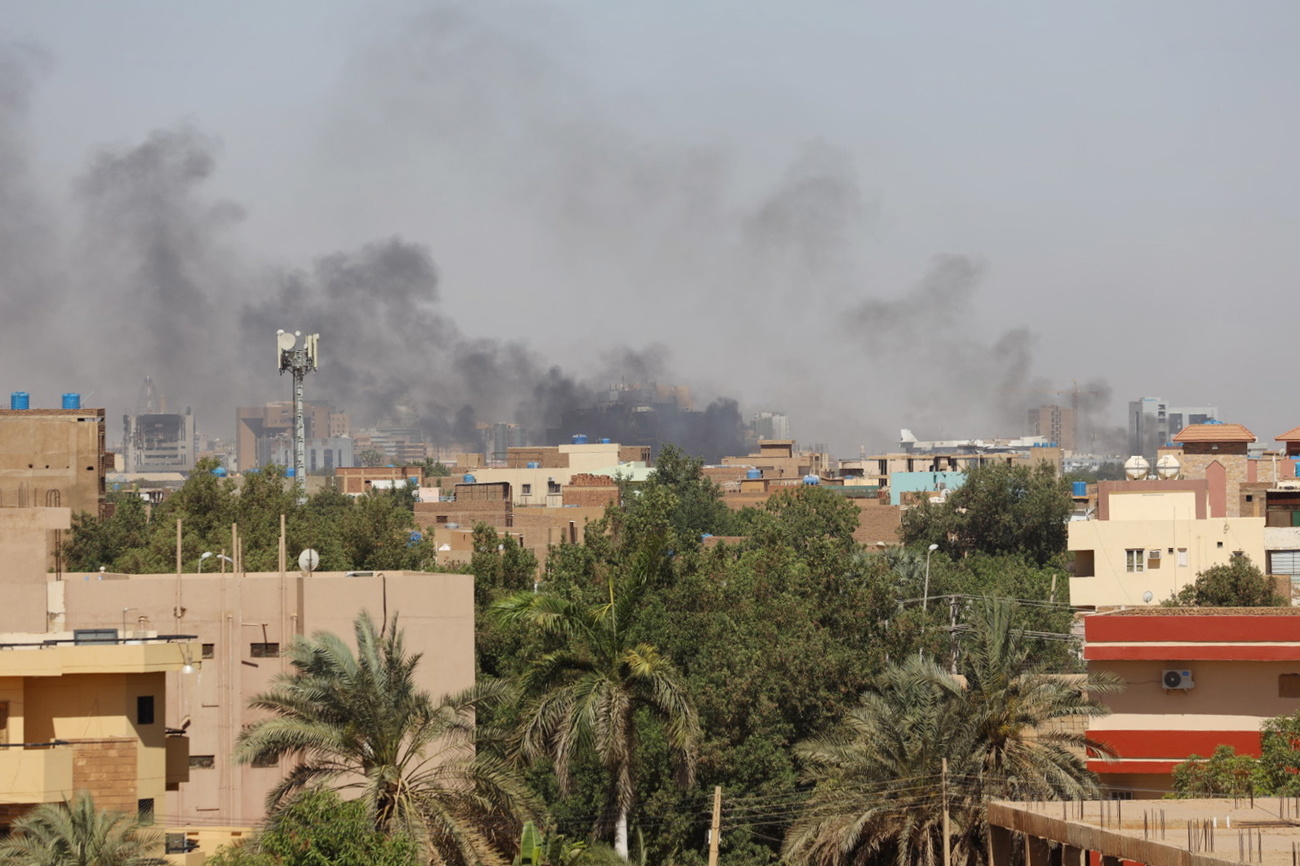 Smoke rises over the city during ongoing fighting in Sudan