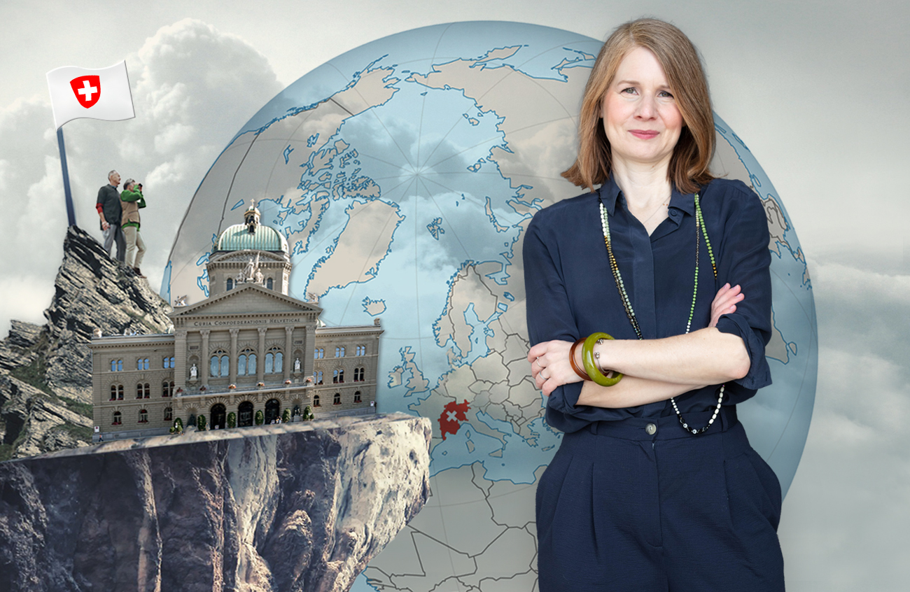 Politologin Sarah Bütikofer schaut in die Kamera, im Hintergrund das Bundeshaus