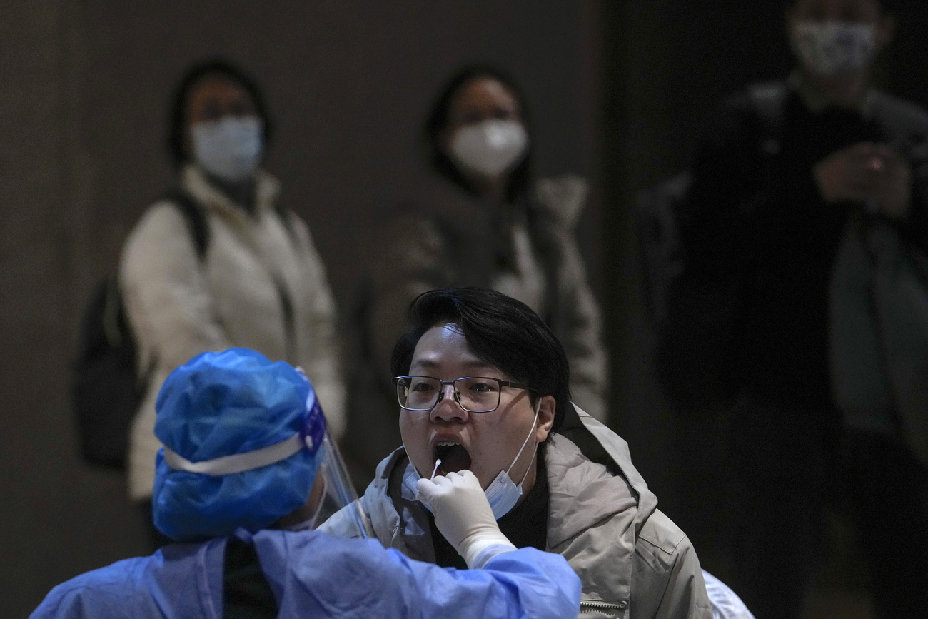 Chinese woman being tested for Covid