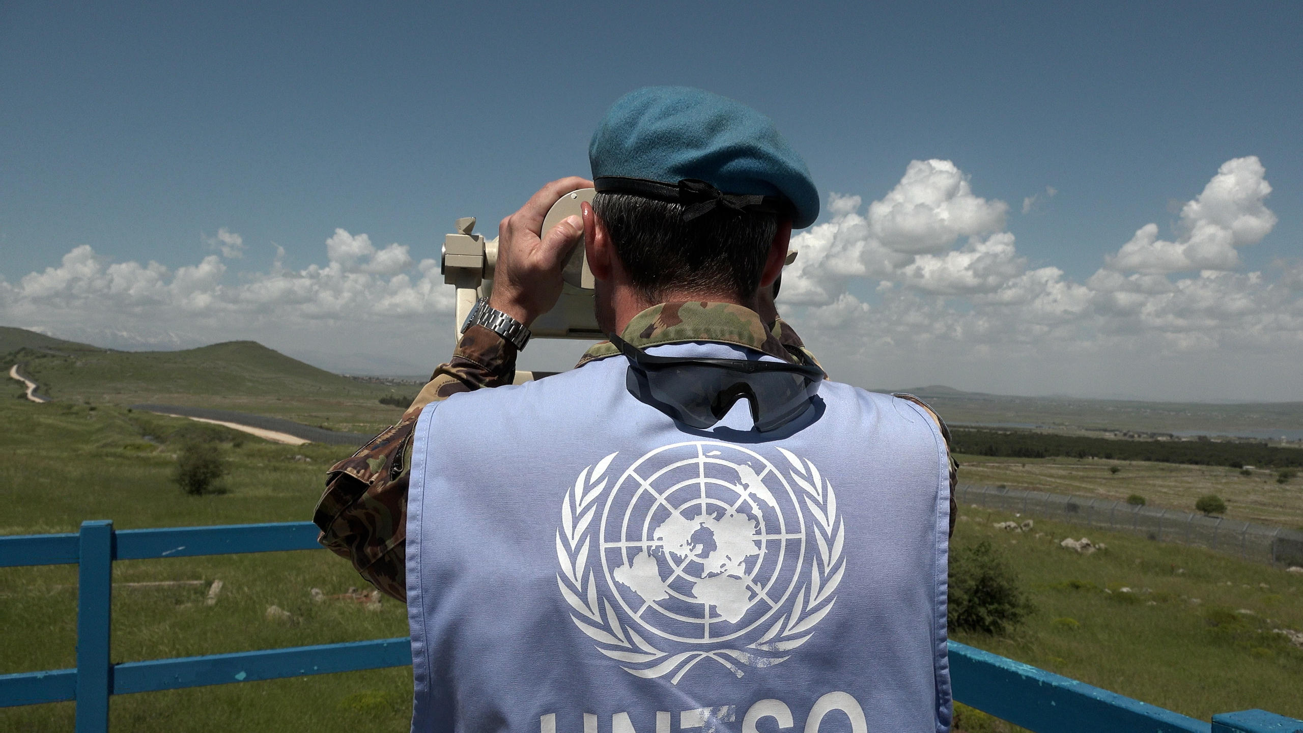 A Swiss military observer keeps watch over the Golan Heights in Israel