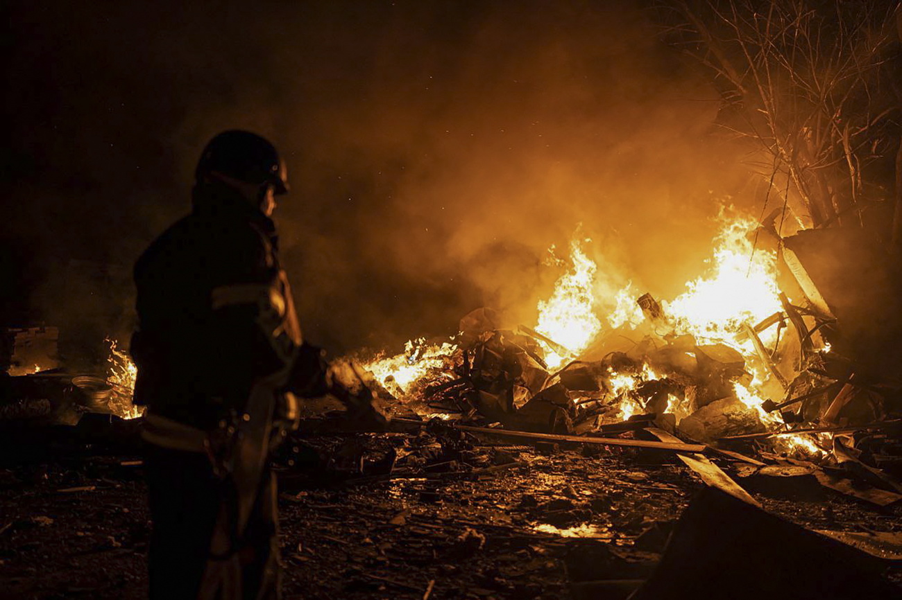 A firefighter tackles a blaze in Kyiv