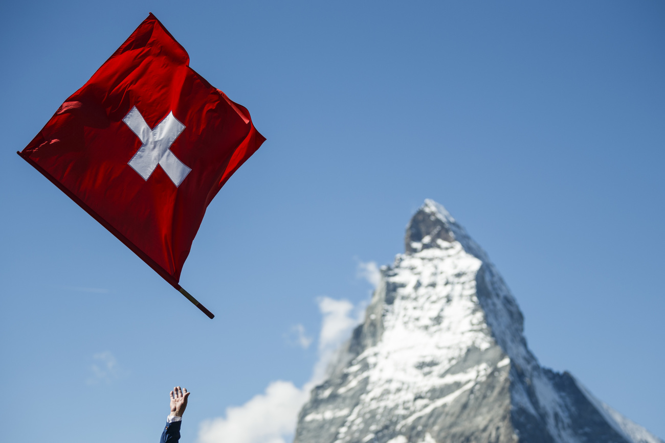 swiss flag waving with matterhorn