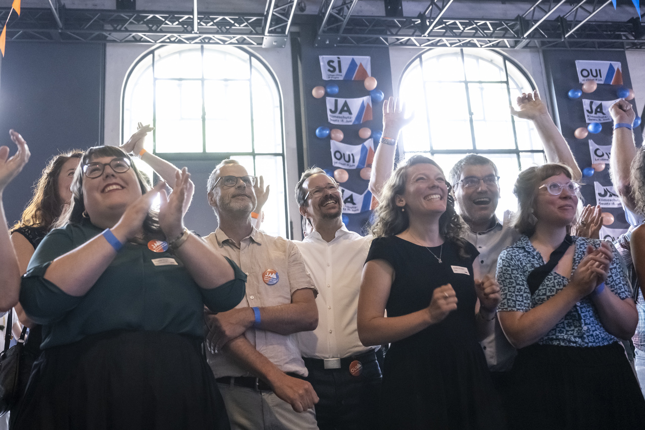 Photo of people clapping