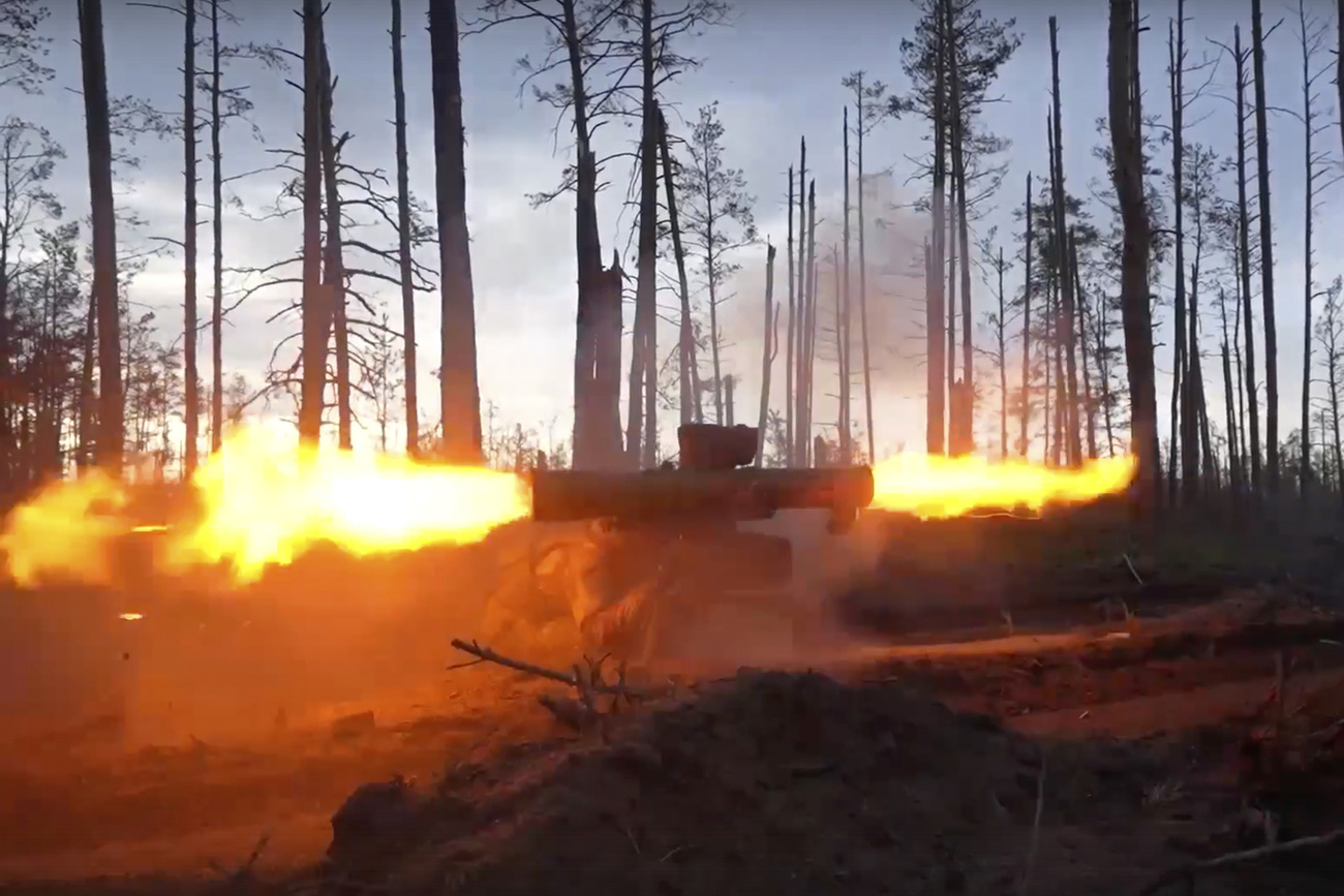A Russian soldier firing in Ukraine
