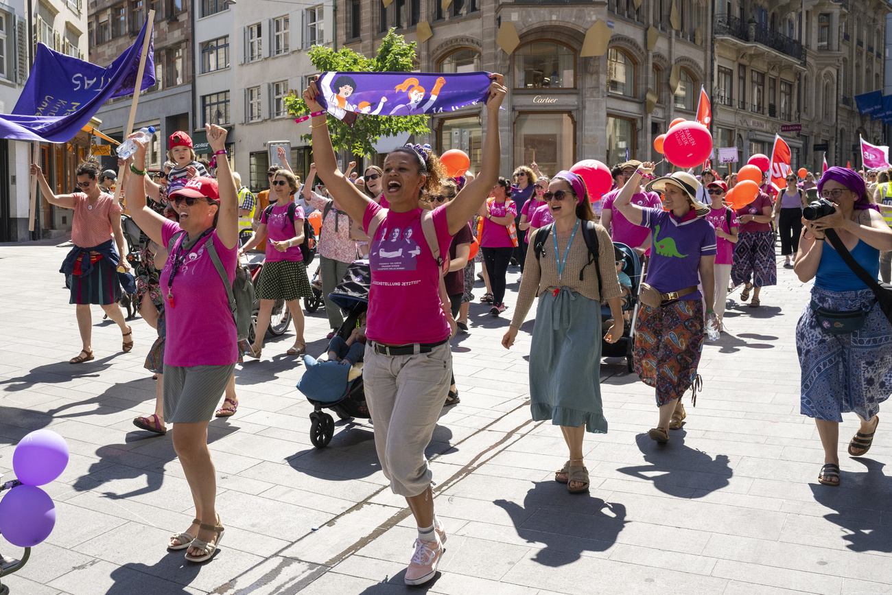 Protesters take part in national women s strike in Basel on June 14.