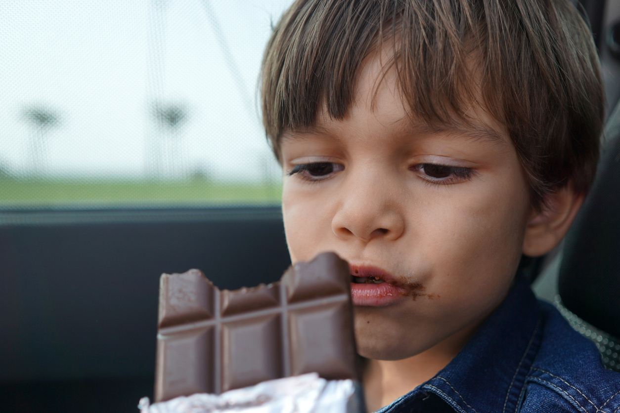 boy eating chocolate