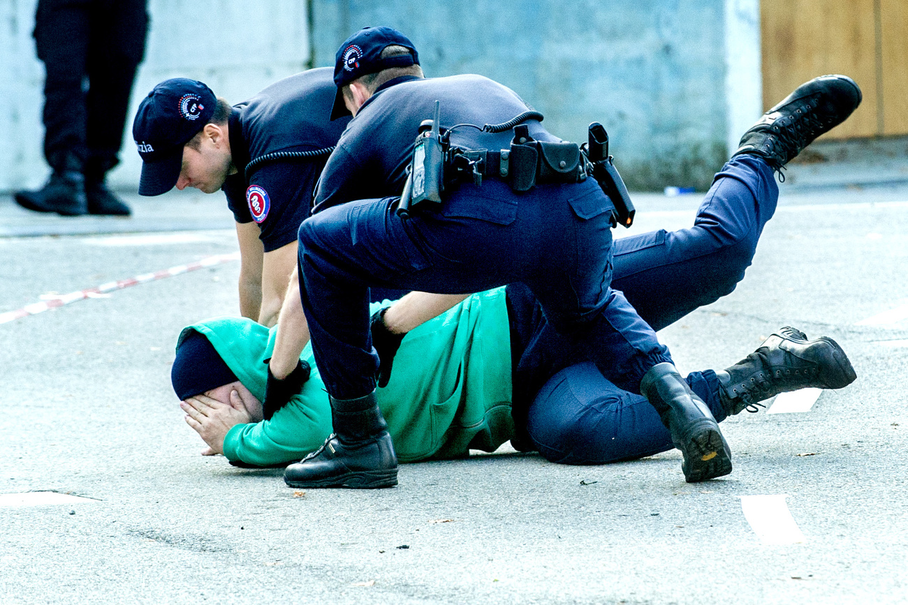 police restraining a person