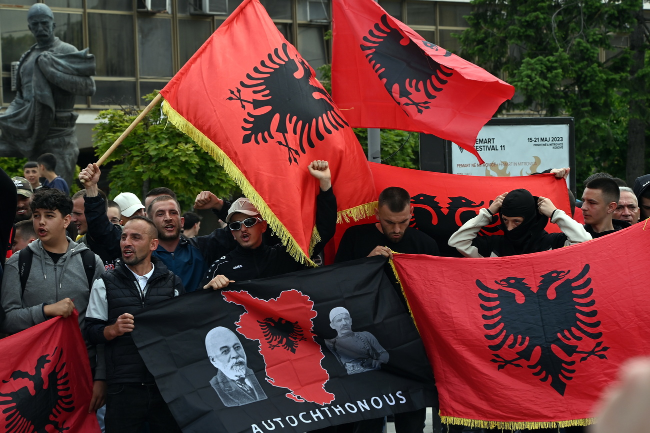Photo of men protesting in Kosovo