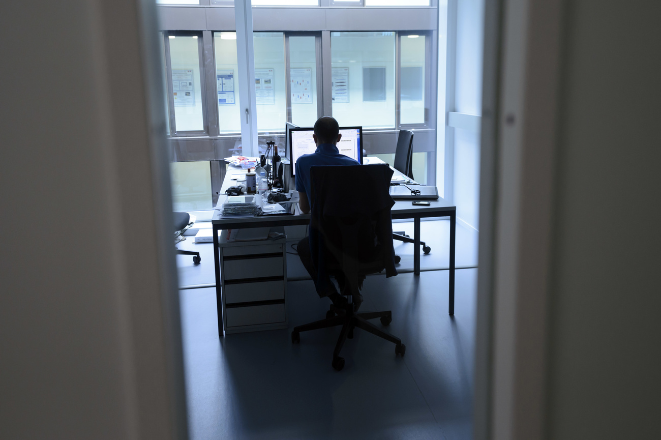 man alone in office