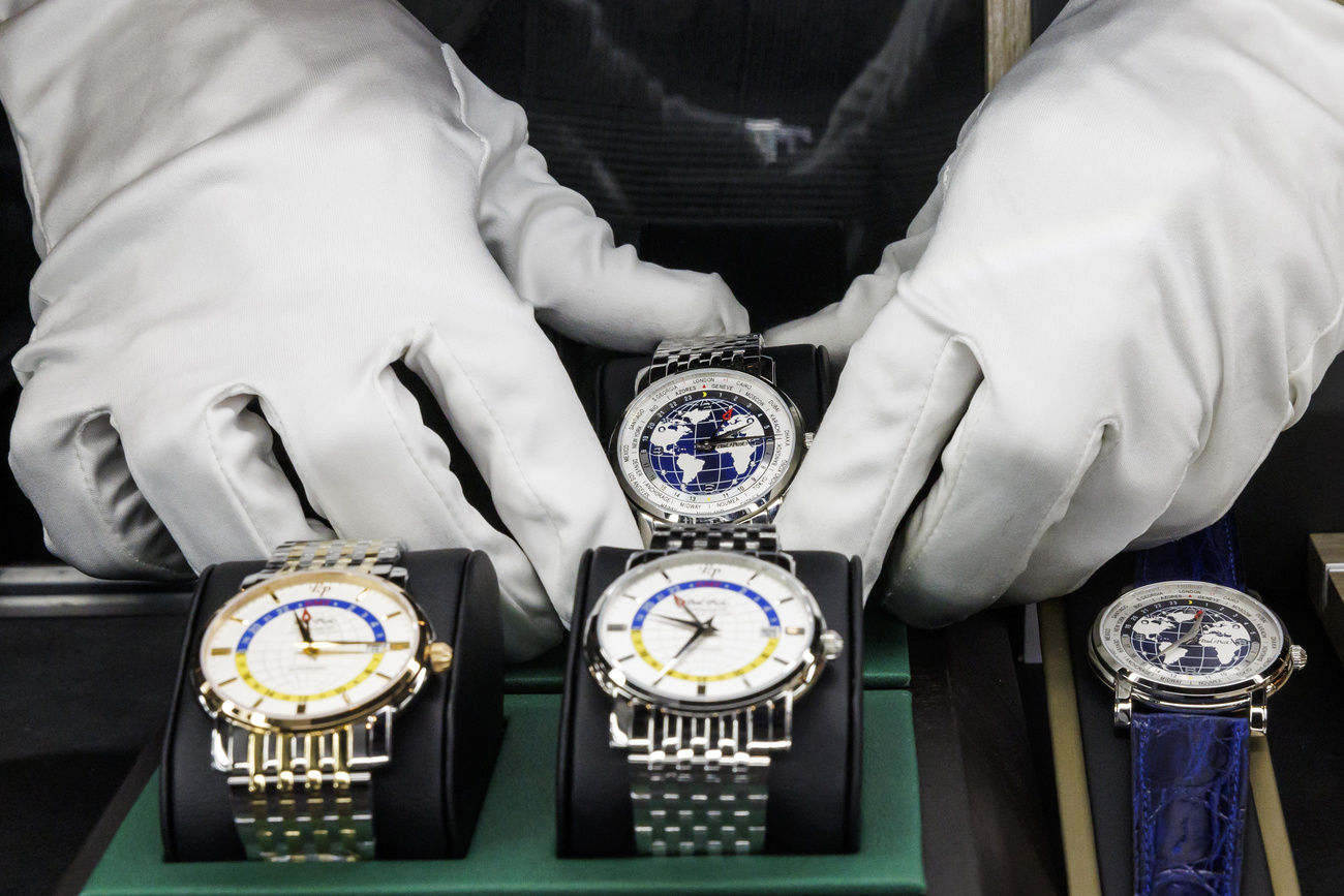 Photo of hands with gloves touching luxury watches