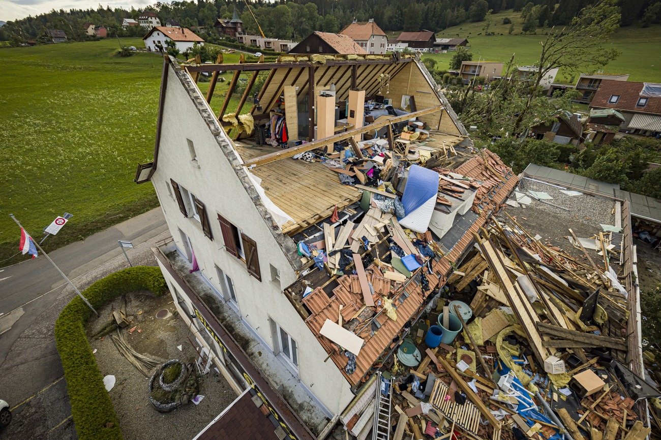 A house with its roof torn off