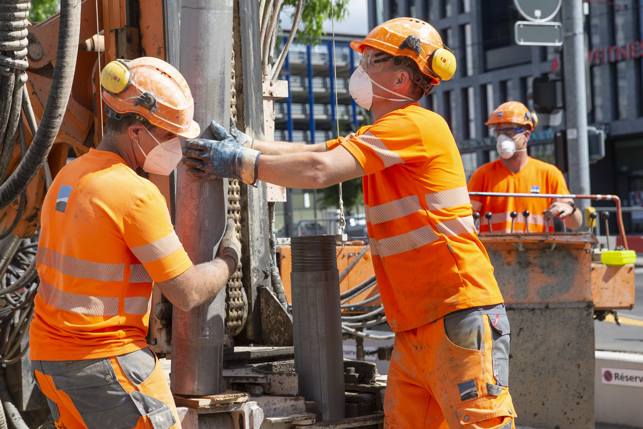 Trabalhadores da construção civil na Suíça