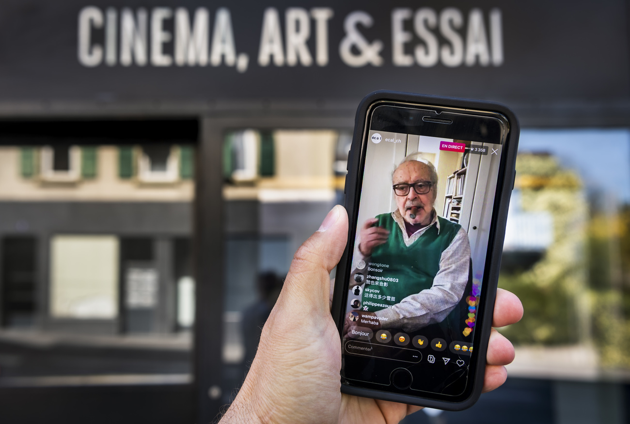on a smartphone the French-Swiss filmmaker Jean-Luc Godard speaking