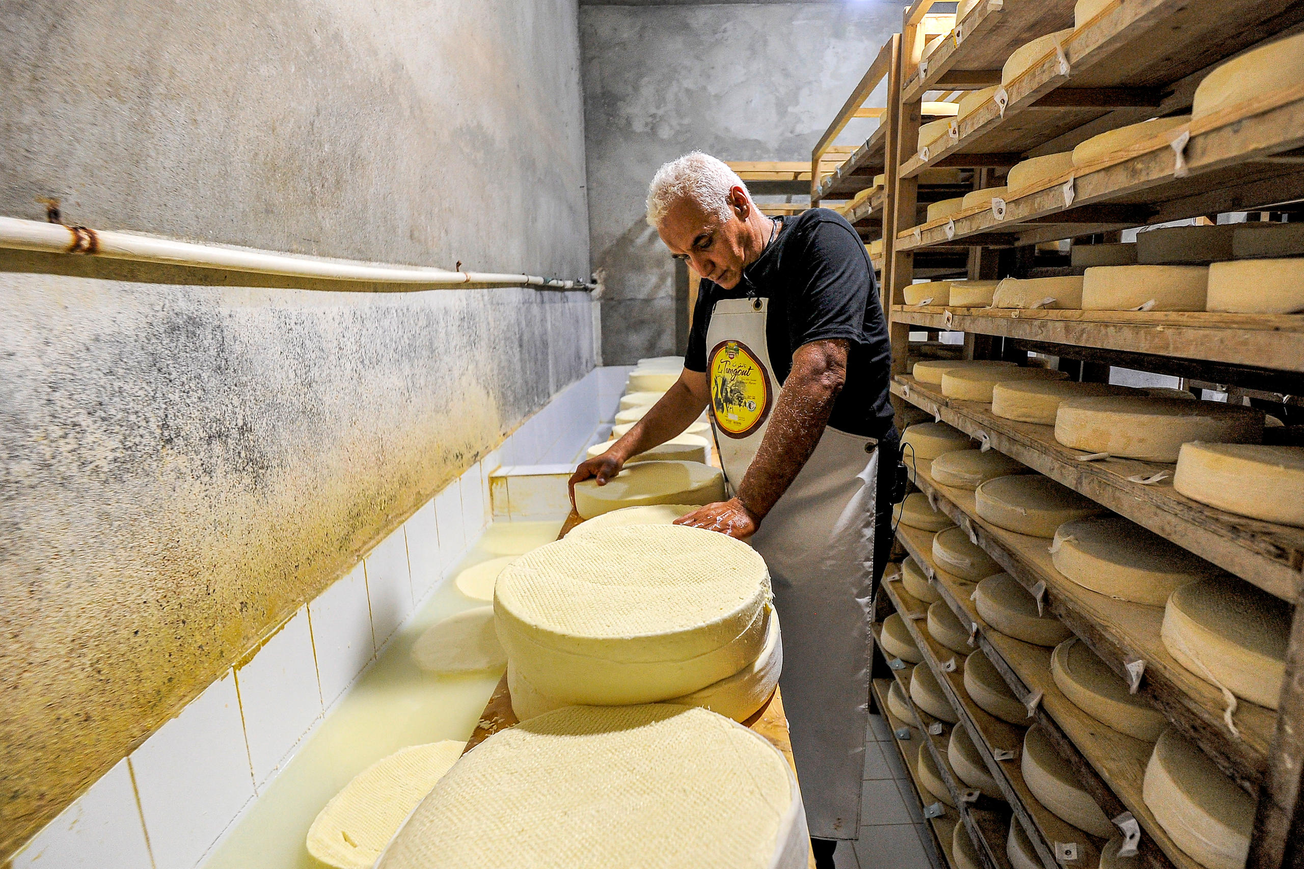 Man making cheese