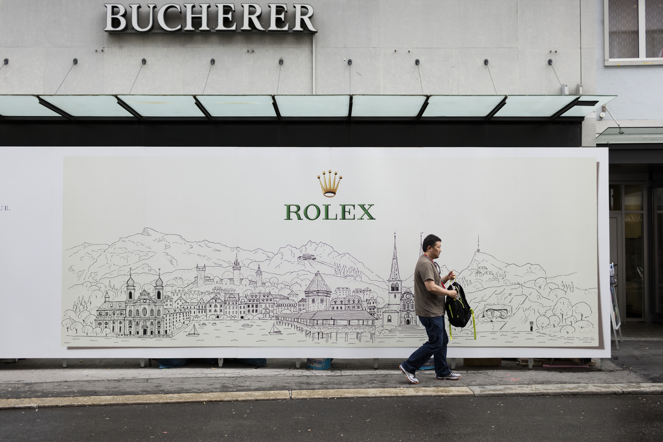 bucherer logo above rolex logo on street
