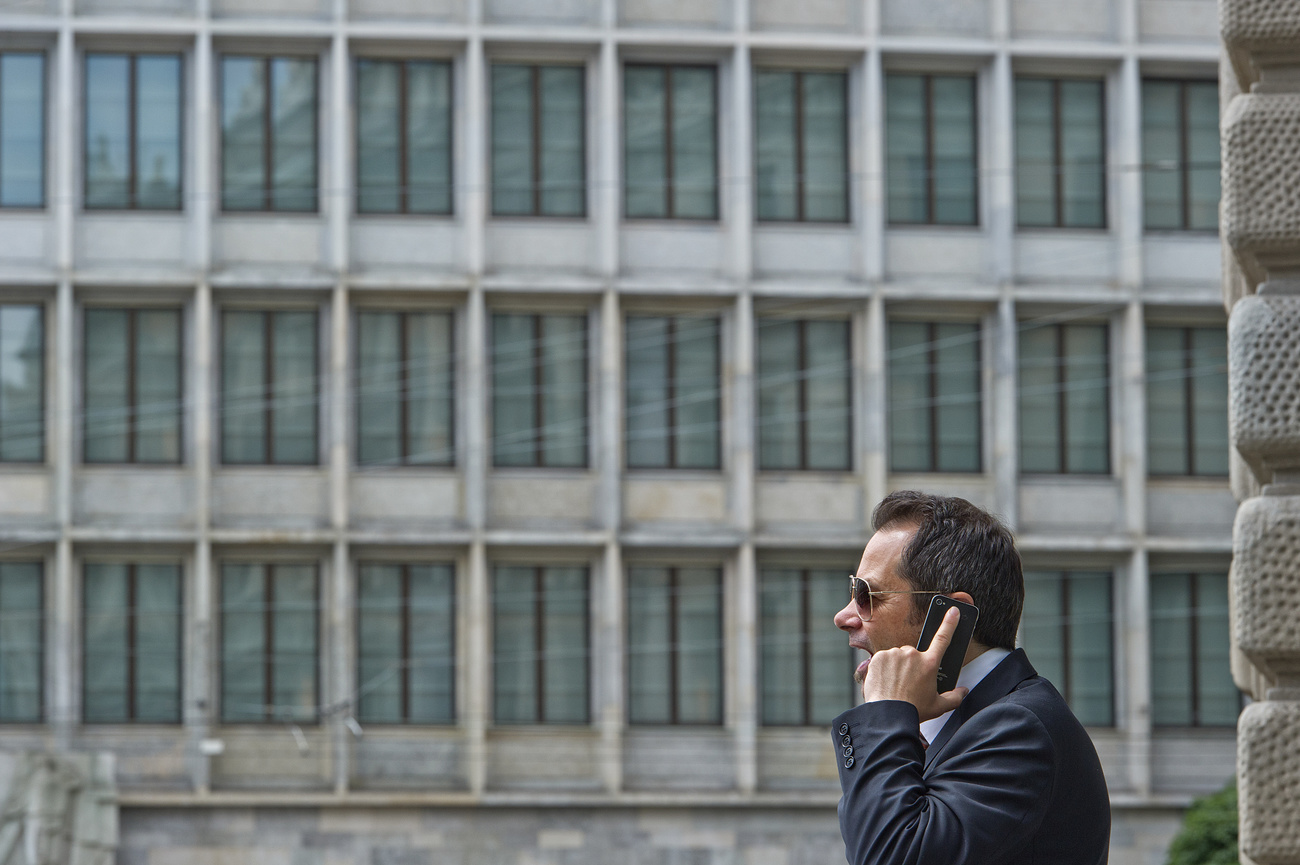 man talking on the phone - roaming charges are very high