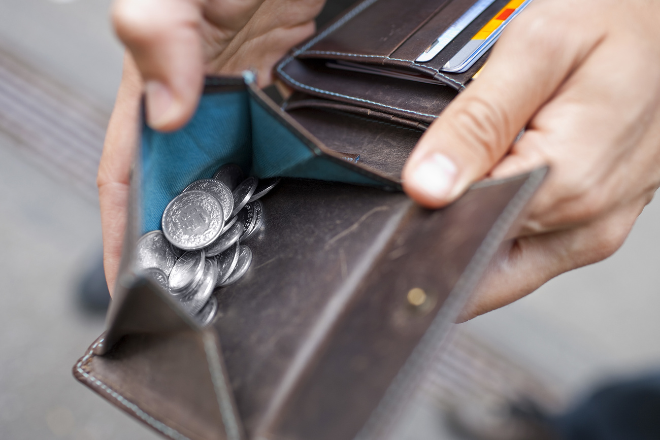 Hands holding a wallet