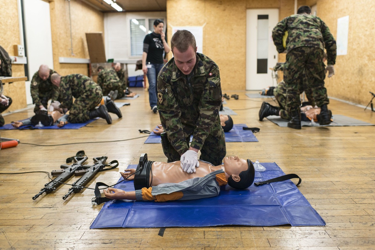 Photo of a soldier doing medical training