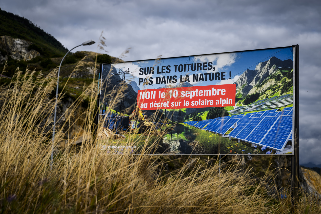 Campaign poster for Alpine solar farms vote in canton Valais.