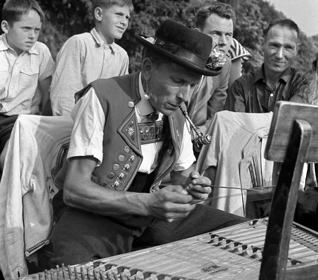 A man plays the dulcimer