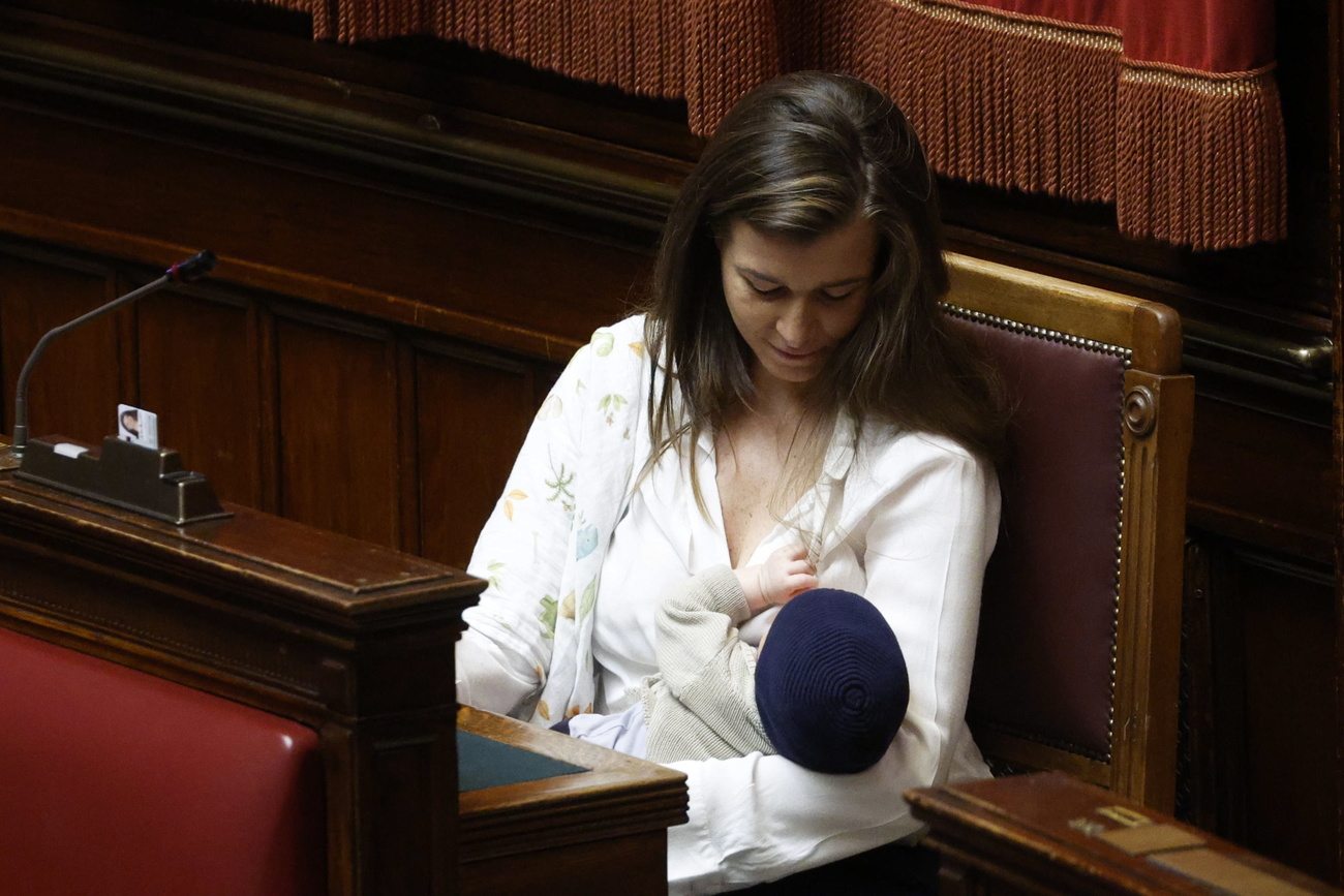 Italian MP Gilda Sportiello nurses her son in the Chamber of Deputies in Rome