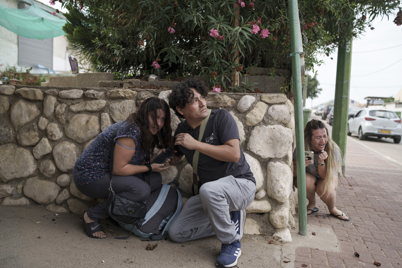 Israelis take cover from rocket fire