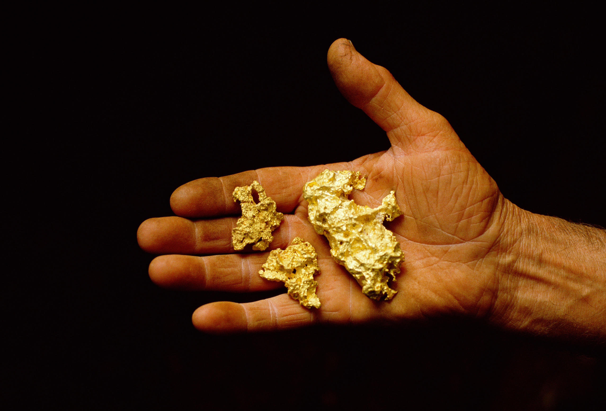Hand in gold