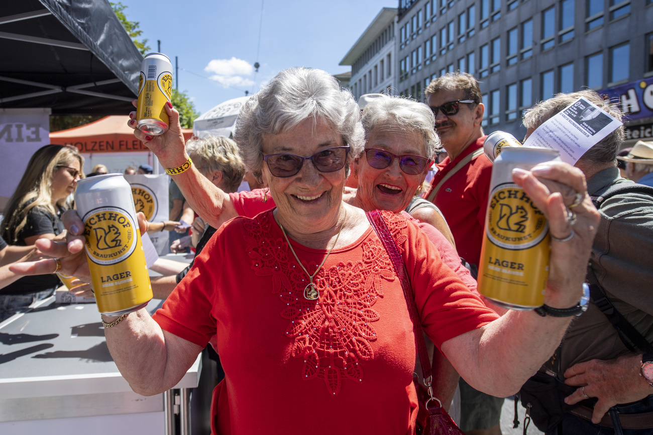 Old women drinking beer