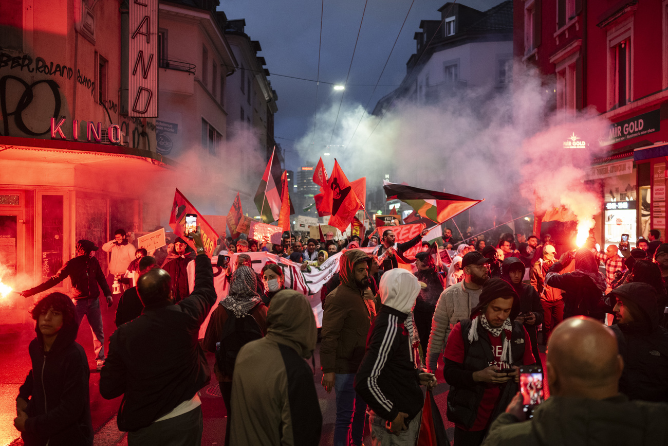 gathering of people with flares