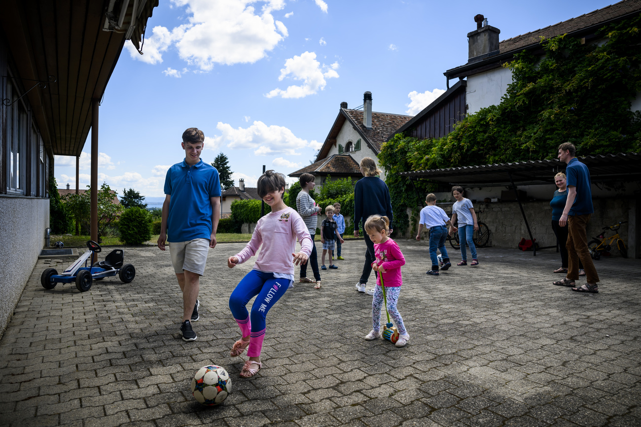 Ukrainian refugees playing