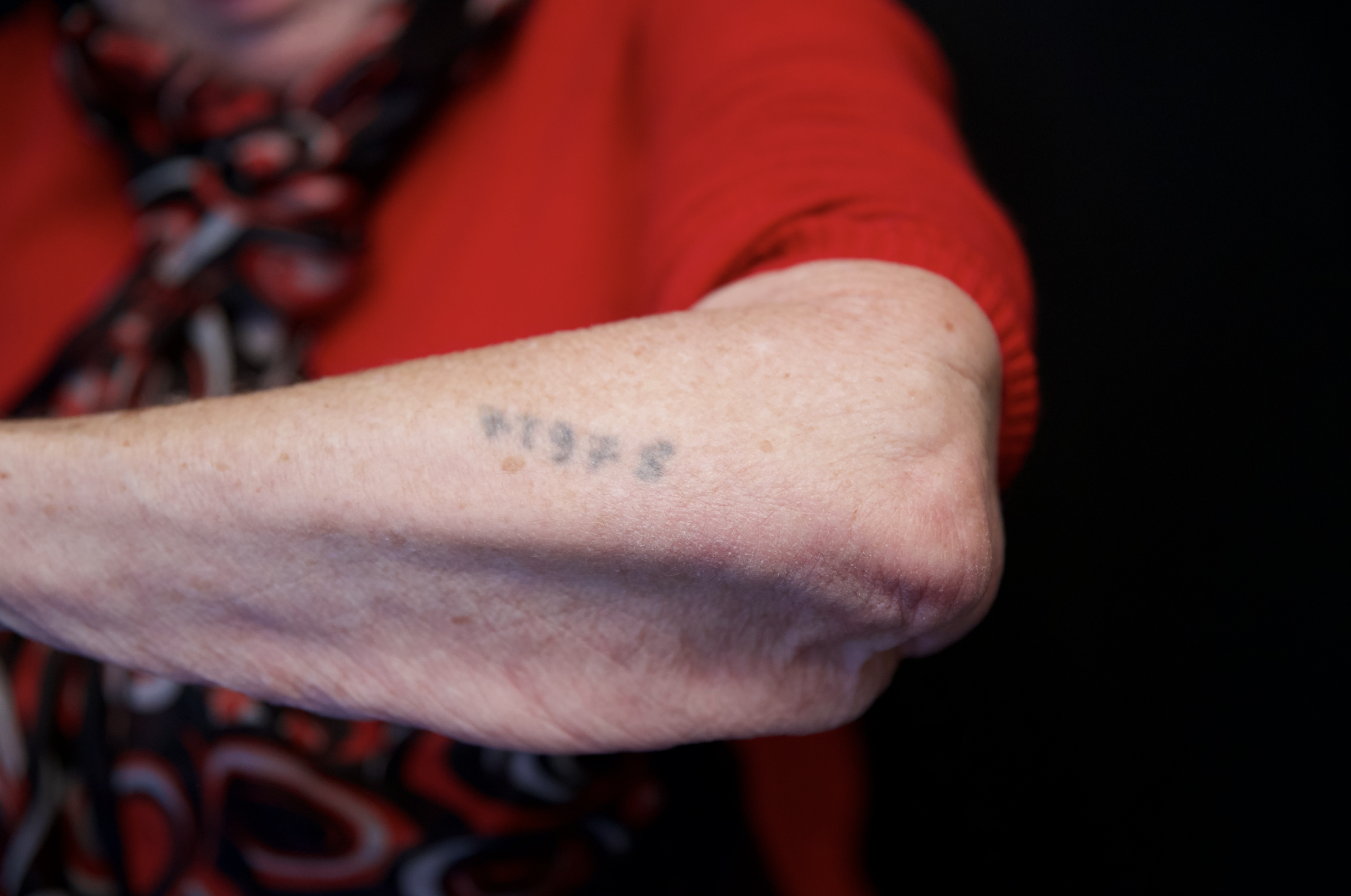 Concentration camp tattoo on the arm of Nina Weil