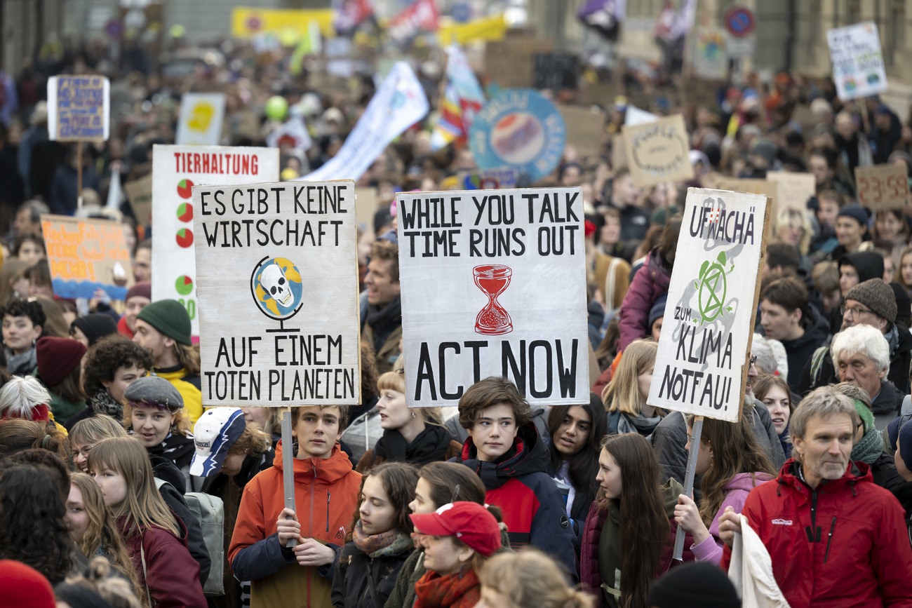 People protest in Bern for more climate action