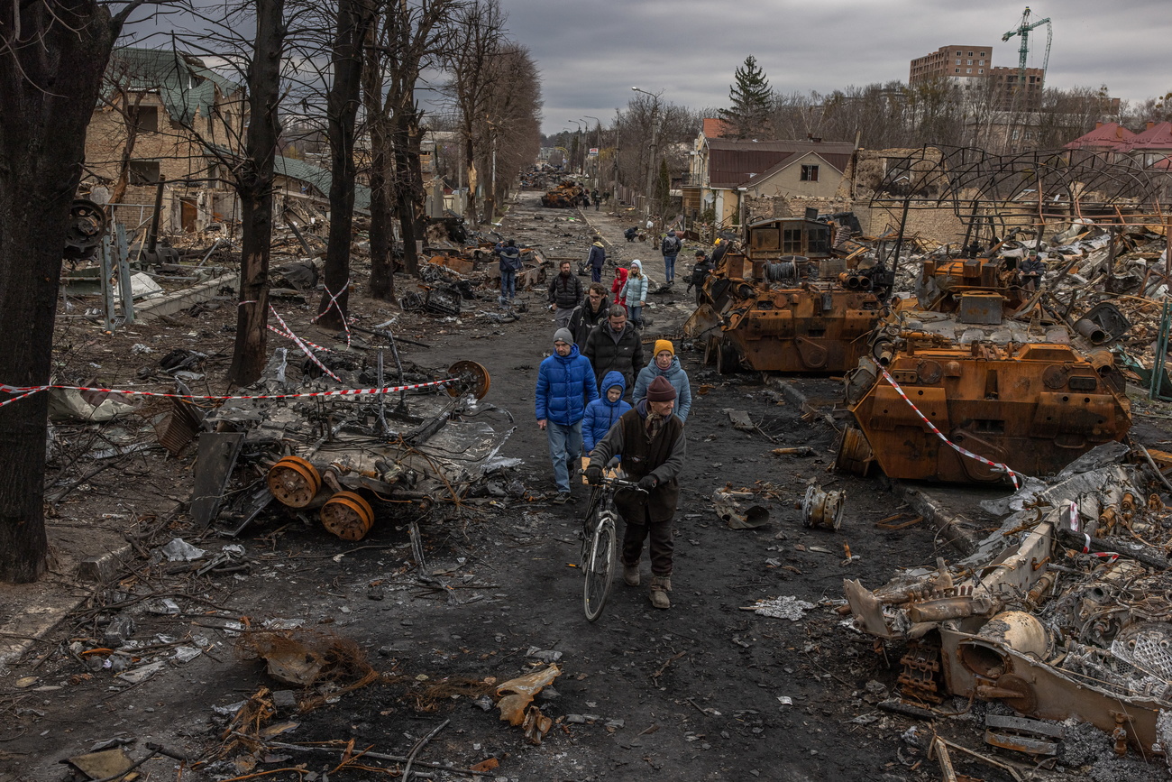 Children in a bombarded Ukrainian street