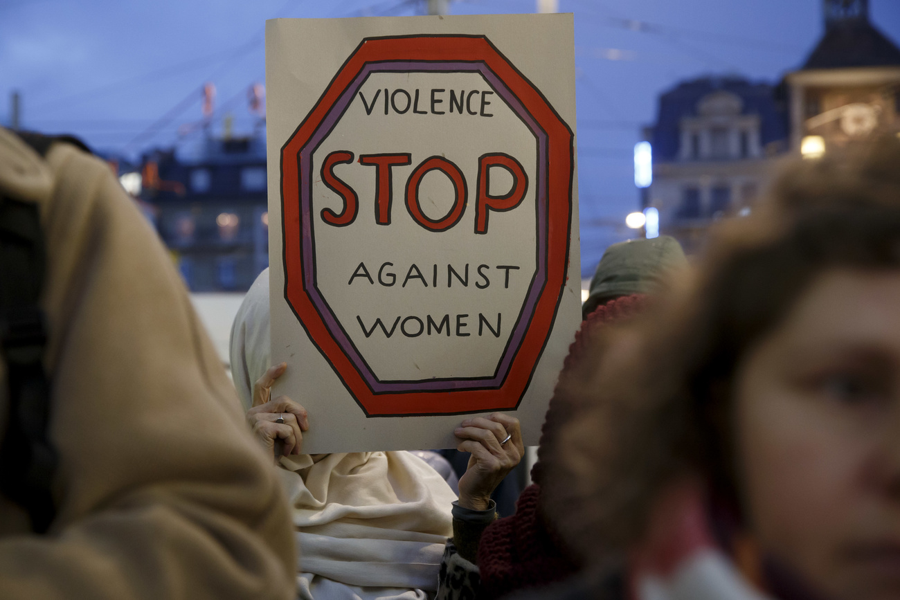 People demonstrating in Switzerland against violence towards women