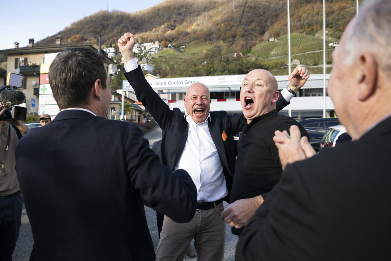 The Centre parliamentarians celebrate.