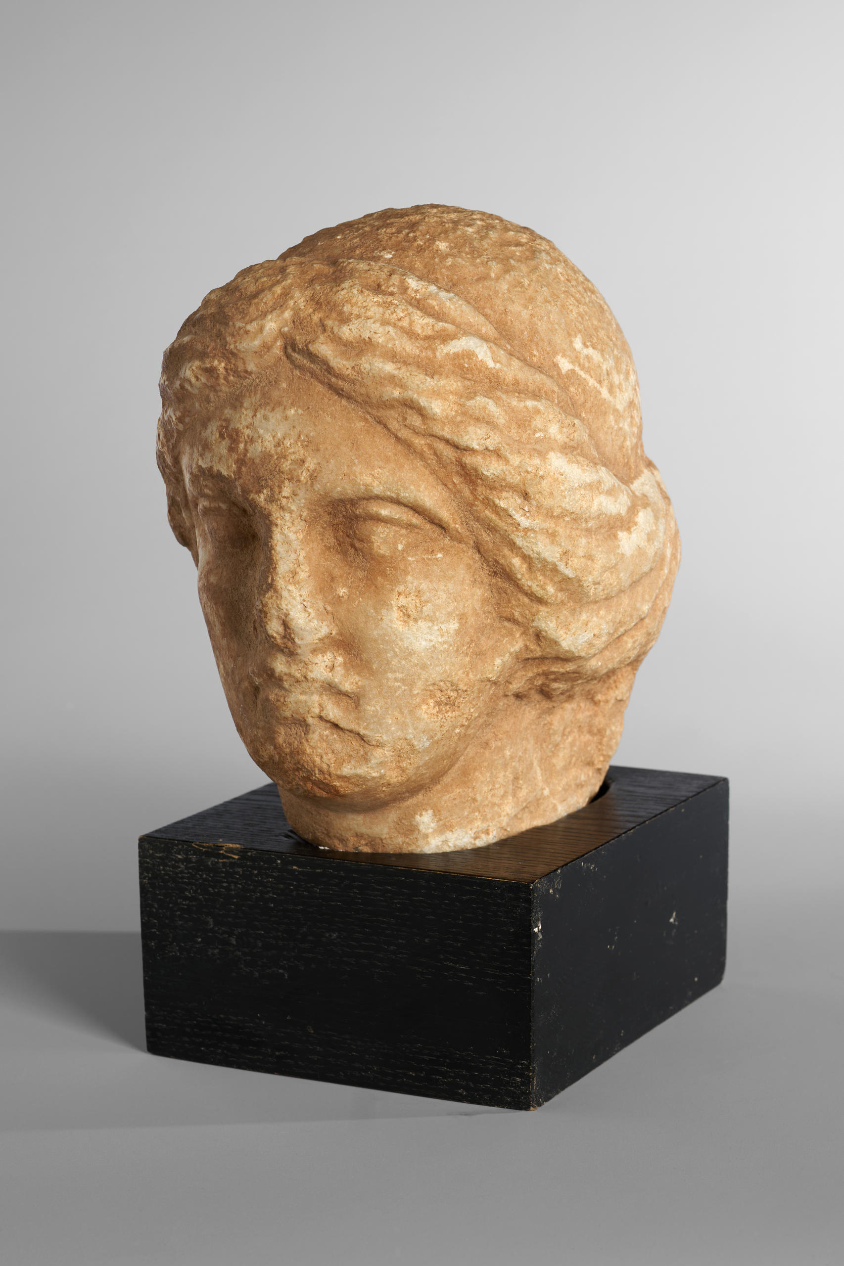 Marble sculpture of the head of a young woman